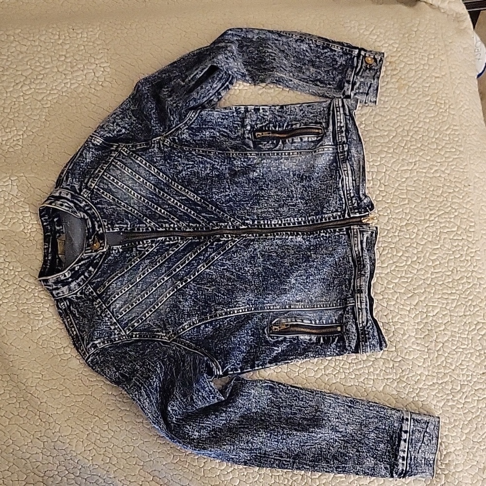Used denim jackets with front zip and front pockets